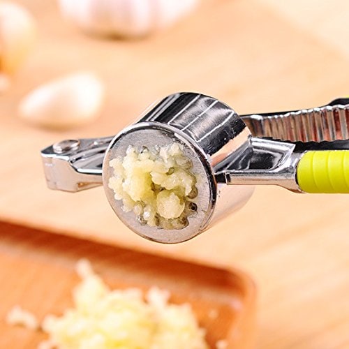 NEW STEEL GARLIC PRESS WITH YELLOW